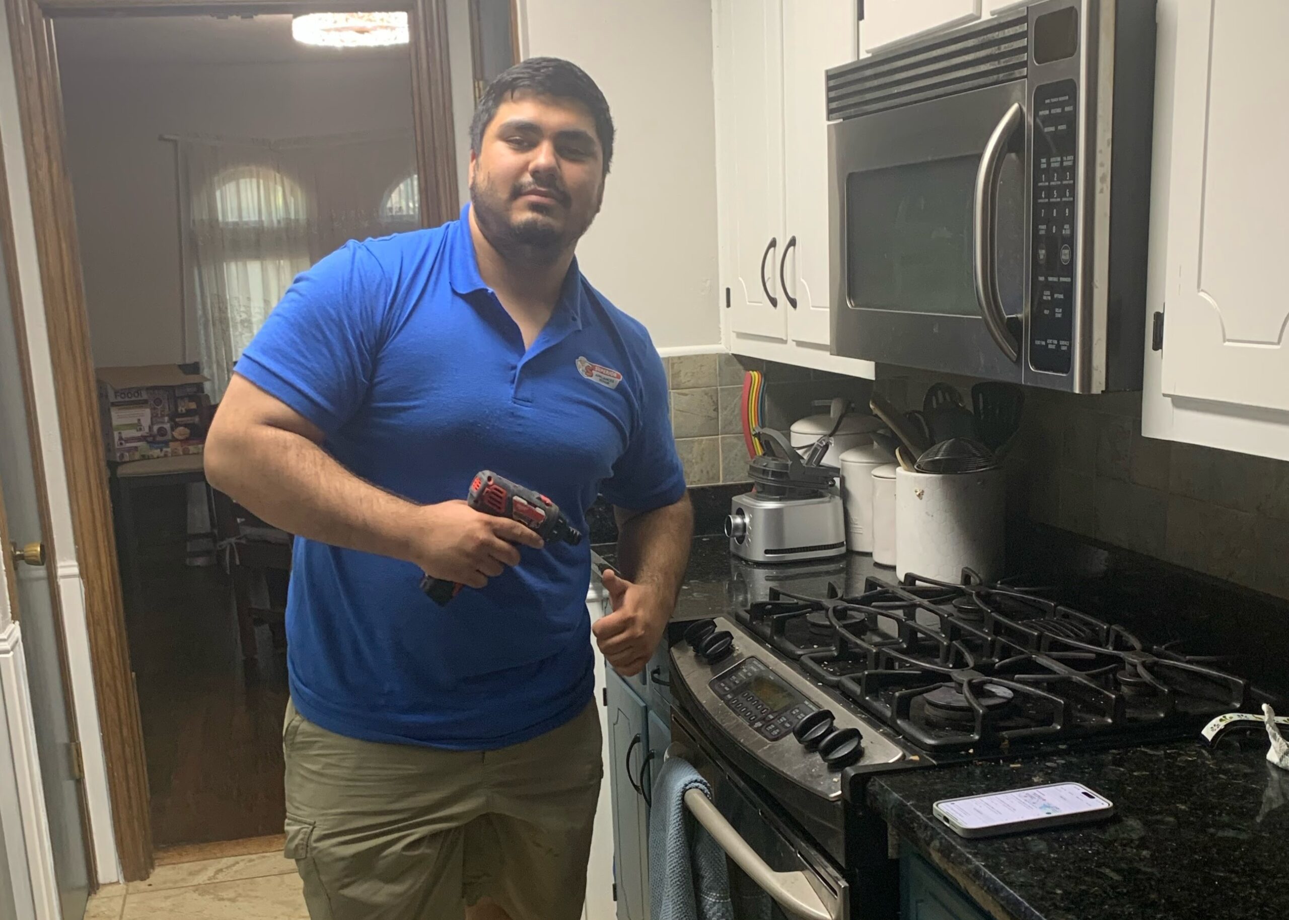 expert repairing stove