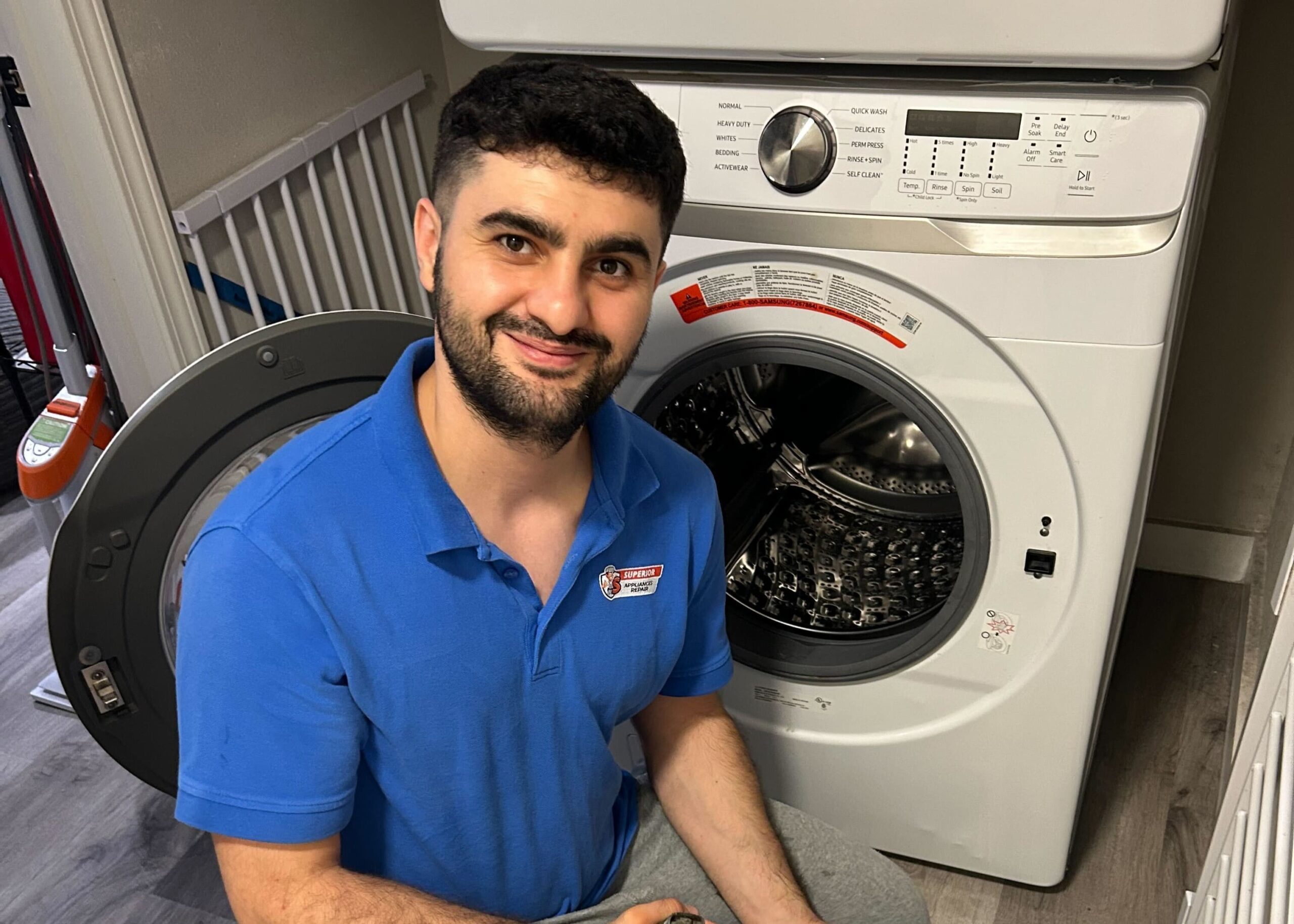 Repairman fixing appliance
